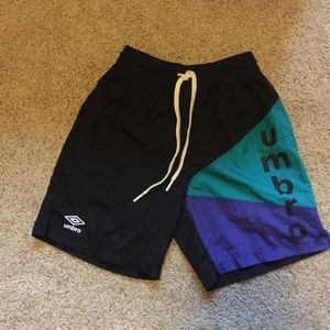 Men’s blue, purple, and black Umbro nylon shorts